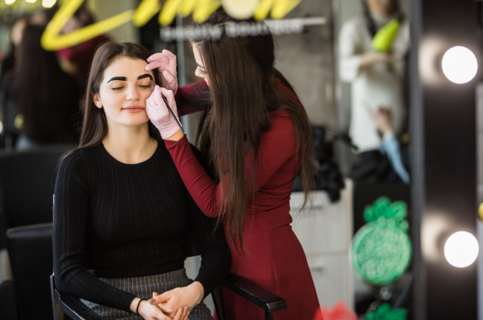 Makeup Artist in Richmond at Salon Victoria Makeup & Hair creating flawless eyebrow styling for a satisfied client.